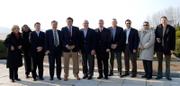 U.S. presidential candidate and New Mexico governor Bill Richardson, fifth from left, poses with his delegation on arrival Sunday at an airport in Pyongyang, North Korea. Richardson, who has undertaken diplomatic missions to countries at odds with the United States, is visiting isolated North Korea to recover remains of American servicemen killed in the Korean war. The four-day trip that started Sunday with the endorsement of the administration of U.S. President George W. Bush comes days before a crucial deadline in a recent nuclear disarmament accord.