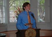 Baker University senior Marty Johnston speaks at a news conference. Johnston announced Monday he had signed a one-year contract with the Vancouver Whitecaps of the United Soccer Leagues.