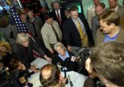 Gov. Kathleen Sebelius is surrounded by media members, legislators, Woodlands officials and others Wednesday afternoon shortly after signing a bill authorizing expanded gambling at The Woodlands in Kansas City, Kan. The law allows for several casino-resorts in the state as well as 2,800 electronic video games at The Woodlands.
