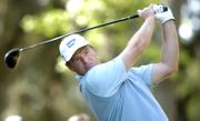 ERNIE ELS WATCHES HIS TEE SHOT ON THE 15th hole during the second round of the Verizon Heritage golf tournament. Els shot a 65 on Friday for the second straight day, good for a three-shot lead at Harbour Town Golf Links in Hilton Head Island, S.C.