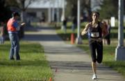 Melissa Todd, of Manhattan, competes in the Lawrence Half-Marathon. Todd took first place in the women's division.
