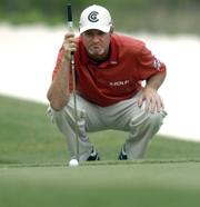 Jerry Kelly lines up a putt on the 16th green during the third round of the Verizon Heritage golf tournament. Kelly leads the tournament by a stroke after Saturday's third round at Hilton Head Island, S.C.