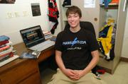 Emerson Spartz, a Notre Dame University sophomore, sits in his dorm room next to a computer displaying his Harry Potter Web site, mugglenet.com, in South Bend, Ind. Fans across the world are reflecting upon the Potter craze that started eight years ago as the book series ends this summer with "Harry Potter and the Deathly Hallows."