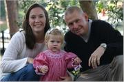 Christi, Addi and Bo Johnson are shown in this family portrait. Bo, a nonsmoker, was diagnosed with lung cancer. The couple is raising awareness, hoping a cure will be found.