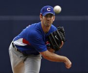 Chicago's Mark Prior delivers against San Diego during a spring-training game in Peoria, Ariz. The Cubs hurler will miss the 2007 season following surgery on his right shoulder.
