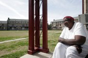 Dorothy Lee Jackson, 73, sits on the porch of her home in the B.W. Cooper housing development in New Orleans. The U.S. Department of Housing and Urban Development wants to tear down B.W. Cooper and other major New Orleans housing projects.