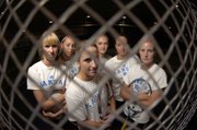 KANSAS UNIVERSITY TENNIS PLAYERS, FROM LEFT, Elizaveta Avdeeva, Kunigunda Dorn, Stephanie Smith, Yuliana Svistun, Edina Horvath and Lauren Hommell gather for a team photo. All but Smith and Hommell are foreign players, a trend in the collegiate tennis ranks.