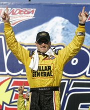 Bobby Labonte celebrates his victory in the Busch Series Aaron's 312. Labonte won Saturday in Talladega, Ala.