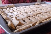 Organic biscottis cool on a cookie sheet after Victoria McDowell baked them in Jackson, Mo. McDowell owns Miss Autumn's Barkery, an organic pet food business.