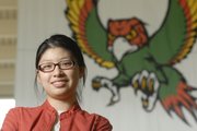 Free State High School senior Jing Li won a $2,500 scholarship from the National Merit Corp. Li, pictured Tuesday at FSHS, will attend the Massachusetts Institute of Technology in the fall.