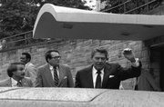 U.S. President Ronald Reagan winces as he was shot by an assailant outside a Washington hotel in this March 30, 1981, file photo. Reagan described the experience simply in one of his presidential diaries: "Getting shot hurts." Excerpts of his diaries are published in the June issue of Vanity Fair magazine.