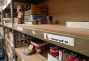 Paul Hunt, director of human service programs at the Ballard Community Center, says Saturday's food drive will stock the center's food pantry for a month.