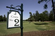 A SIGN IDENTIFIES THE PINEHURST NO. 2 GOLF COURSE designed by Donald Ross. The famed course in Pinehurst, N.C., is celebrating its 100th birthday this year and has earned a reputation as one of the sport's toughest courses to tame.
