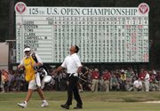 MICHAEL CAMPBELL WALKS ONTO THE GREEN with his caddy, Michael Waite, on the 18th hole at Pinehurst No. 2 during the final round of the 105th U.S. Open in 2005. Campbell won the tournament, one of many highlights the famed course has witnessed in its 100 years.
