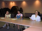 Lawrence Memorial Hospital 8:00pm - Volunteer team leaders from the Lawrence Half Marathon & 5k share notes from the event. From right: Karin Feltman, RN - LMH ER Nurse, Jaye Cole - Director, Kreider Rehab, Cindy Johnson - Owner, TherapyWorks. TherapyWorks was also a major sponsor of the event.