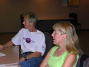 Lawrence Memorial Hospital 7:45 pm - Lawrence Half Marathon & 5k race directors Steve & Marcia Riley listen to volunteer feedback during a race wrap up meeting. This benefit, our most successful and largest event to date, raised $42,000 for the Clinic.