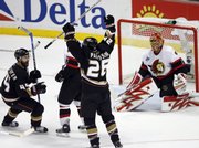 Anaheim's Samuel Pahlsson (26) celebrates with teammate Rob Niedermayer (44) after scoring on Ottawa goaltender Ray Emery during the third period. The goal was the only score in the Ducks' 1-0 victory Wednesday in Anaheim, Calif.