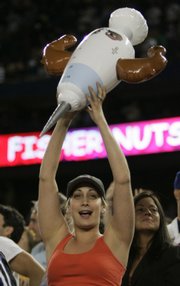 A New York Mets fan taunts San Francisco's Barry Bonds as he bats against the Mets. Bonds is 10 home runs shy of Hank Aaron's career record of 755, but says it's too early to talk about it.