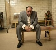James Gandolfini portrays Tony Soprano in a scene from one of the last episodes of HBO&squot;s "The Sopranos."