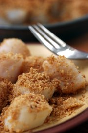 Baked Scallops with Spicy Peanut Topping have Thai accents with the inclusion of peanuts to the topping.