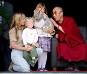The Dalai Lama, right, meets the Irwin family, from left, Terri, Bob and Bindi, with a koala, at Australia Zoo in Beerwah. The Dalai Lama spoke on animal rights at the zoo built by "Crocodile Hunter" Steve Irwin.