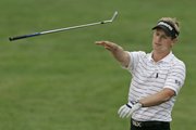 Luke Donald throws his putter after missing a birdie putt on the 13th green during the first round of the U.S. Open. Donald shot a 4-over 74 on Thursday at Oakmont Country Club in Oakmont, Pa.