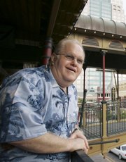 Lou Pearlman poses outside his offices at Church Street Station in Orlando, Fla., on Oct. 27, 2006. Pearlman, who fled the country earlier this year and had not been seen for months, was arrested Thursday after Indonesian officials kicked him out of that country.