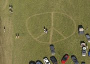 A peace sign mowed in the grass decorates the lawn at the Wakarusa Camping & Music Festival last Friday evening.