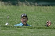 Phil Mickelson reacts after chipping onto the 15th green. Mickelson missed the cut after shooting a 77 in the second round of the U.S. Open on Friday in Oakmont, Pa.