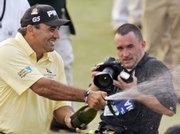 Angel Cabrera sprays champagne. Cabrera became the first Argentine to win the U.S. Open on Sunday in Oakmont, Pa.