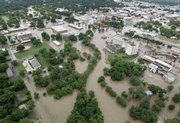Flood waters are seen in and around the downtown Gainesville, Texas, area on Monday. Up to eight inches of rain fell in parts of north Texas since midnight Monday, swamping the towns of Gainesville and Sherman near the Oklahoma border.