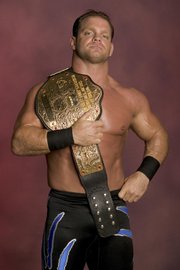 Pro wrestler Chris Benoit strangled his wife, suffocated his 7-year-old son and placed a Bible next to their bodies before hanging himself with a weight-machine pulley, authorities said Tuesday. All three were found slain Monday at their Fayette County, Ga., home.