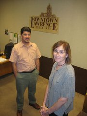 Rick Marquez will turn over his job as director of Downtown Lawrence Inc. to Jane Pennington next month. Pennington now is development director for the Lawrence Community Theatre. They were in Downtown Lawrence Inc.'s office in the U.S. Bank Tower, 900 Mass., on Thursday.