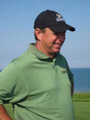 Alvamar head pro Randy Towner waits on the 16th tee as play backs up Friday. Towner didn't make the cut through two rounds of play at the U.S. Senior Open.