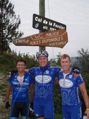 Lawrence's Joe Gatti, left, Dan Hughes, center, and Mike McBride pose at the top of the Col de la Forclaz, one of several epic Tour de France climbs they conquered last summer.
