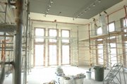 Workers with Eliason & Knuth, Kansas City, Mo., work on the ceilings in a former gallery space at Spooner Hall. The area is being renovated and named the "Commons." It is a collaborative effort of the Hall Center for Humanities, Biodiversity Institute and the Spencer Museum of Art.