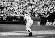 Atlanta Braves' Hank Aaron watches the flight of his 700th career homer. That milestone home run came July 21, 1973, against the Phillies in Atlanta.