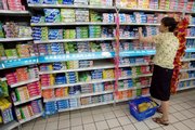 A Chinese woman looks at a wide selection of toothpastes Thursday at a Beijing mall. On Thursday, China banned manufacturers from using a thickening agent in antifreeze as an ingredient in toothpaste, one of its most significant concessions yet as it struggles to regain international confidence in the country's beleaguered exports.