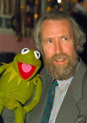 Jim Henson, creator of the Muppets, poses with one of his puppets, Kermit the Frog, in this February 1988 file photo. The Center for Puppetry Arts in Atlanta will receive everything from original puppets to sketches from Henson's personal collection, center officials and the Henson family announced Wednesday.