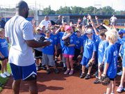 Former Kansas City Royals player Brian McRae ask participants about their infield experience. McRae was one of several former Royals who helped instruct the Royals Youth Clinic on Saturday at Arrocha Ballpark.