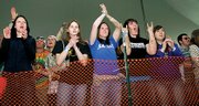 Kansas University students cheer as headlining act The Faint takes the stage at KU's Day On the Hill.