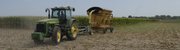 Kent Nunemaker, co-owner of Nunemaker-Ross Inc., cuts corn for silage on land in North Lawrence. The silage will be used to feed cattle in the Nunemaker-Ross cattle feed lot. Although the corn being harvested by Nunemaker-Ross is not being used for the production of ethanol, the company does feed its livestock a high-protein byproduct of ethanol production.