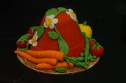 Kennedy O'Dell, of the Meadowlark 4-H Club, was named Champion in the Cooking For Fun category for her Potted Vegetables Cake.
