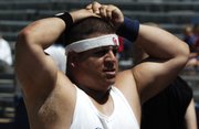 Brady Tanner, of Lawrence, completes a half-mile run during the final workout of Dog Days. On Sunday, Tanner set records for the powerlifting squat and deadlift in the Special Olympics division of the Natural Athlete Strength Association World Cup in Oklahoma City.
