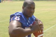 Despite entering just his fifth season of organized football, Kansas University junior offensive lineman Anthony Collins has aspirations of playing in the NFL, and many think he has the skills to get there.
