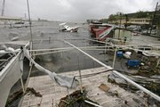 A boat sinks as it takes on water amid debris Friday, after Hurricane Dean, a Category 4 storm, hit Martinique, in Fort de France.