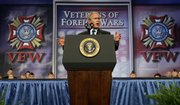 President Bush gestures during a speech to the Veterans of Foreign Wars national convention. Bush was in Kansas City, Mo., on Wednesday to talk to the group.