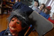 Lawrence attorney and ventriloquist Bonita Yoder owns eight traditional ventriloquial figures, including B. J. Dharma pictured above, and dozens of soft puppets including hand puppets.