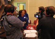 The "Kansas vs. Darwin" crew interviews school board member Connie Morris at the hearings on evolution in Topeka in 2005.