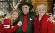 Andrew Jackson "Jack&squot;&squot; Whittaker Jr., his wife, Jewell, and their granddaughter, Brandi Bragg, pose for a photo after being interviewed on NBC&squot;s "Today" show in this December 2002 file photo in New York. Whittaker sometimes wonders if winning the nearly $315 million Powerball game was worth it. After winning the jackpot, his wife left him and his granddaughter died.